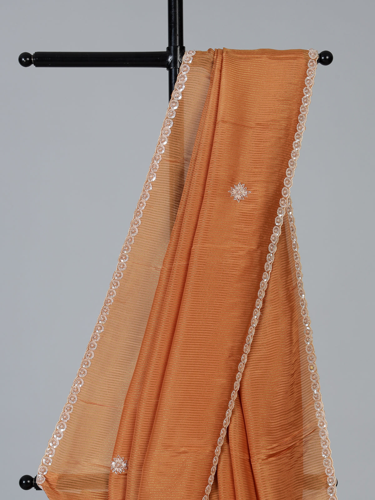 Rust orange shimmer dola silk saree for festive celebrations