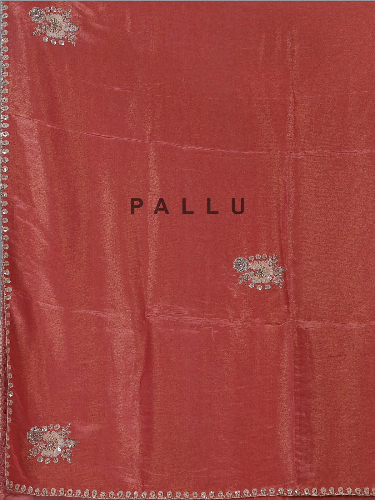 Pastel peach shimmer dola silk designer saree with radiant embellishments
