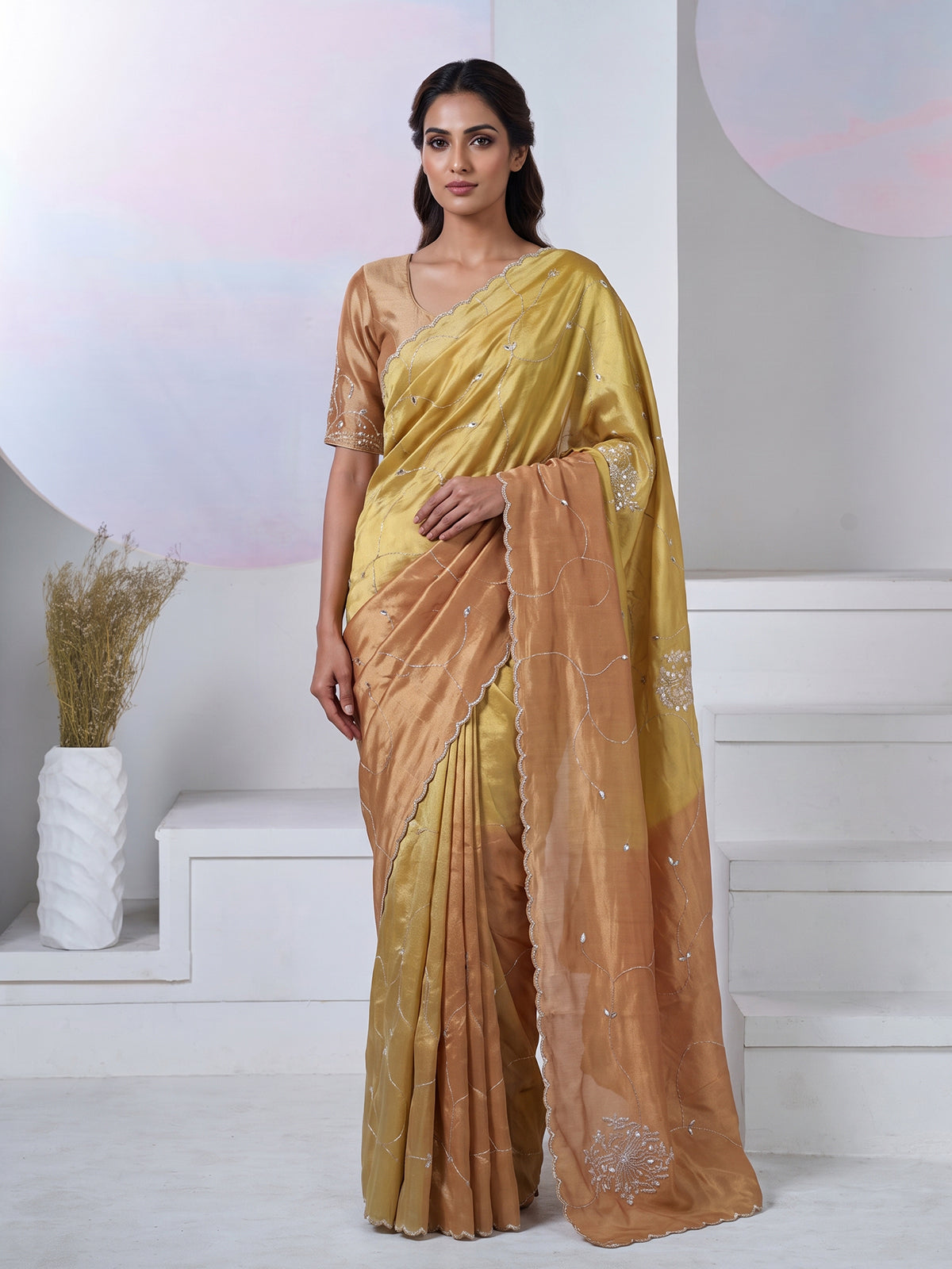 Pastel peach and green tissue silk designer festive saree with elegance