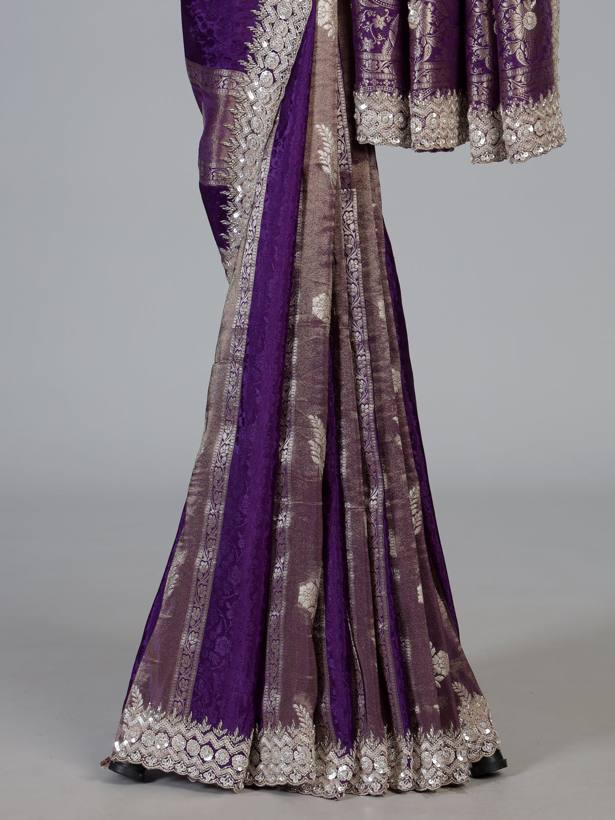 Purple dola silk designer saree with radiant festive