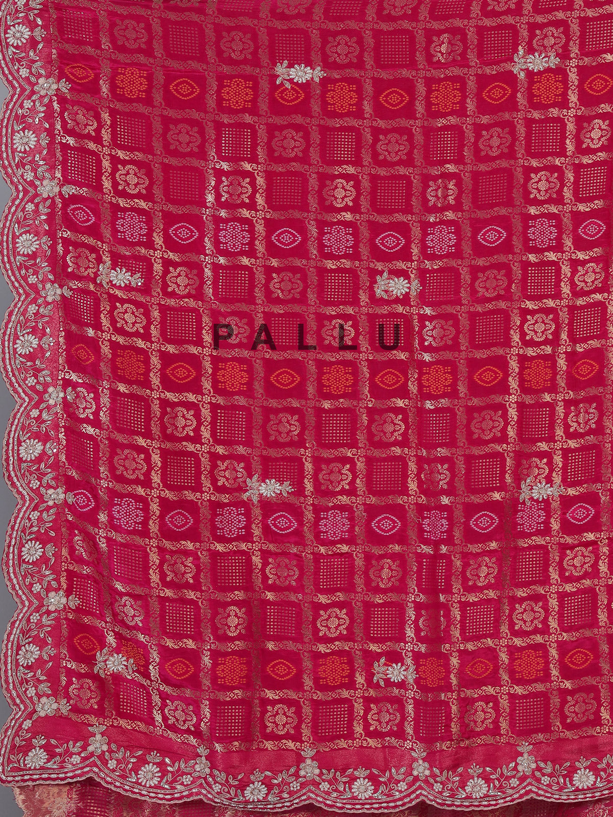 Rani pink bandhani dola silk saree with luxurious festive elegance