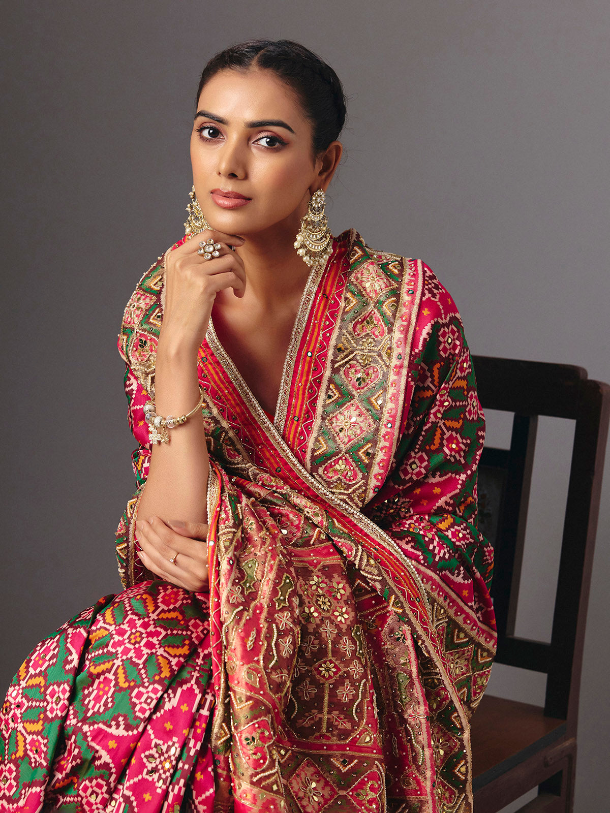 Rani pink art patola silk saree with graceful traditional elegance