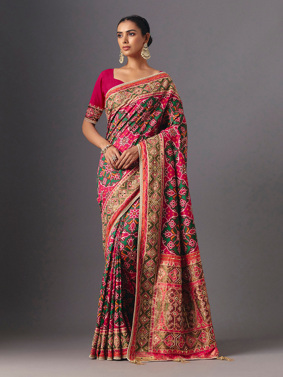 Rani pink art patola silk saree with graceful traditional elegance