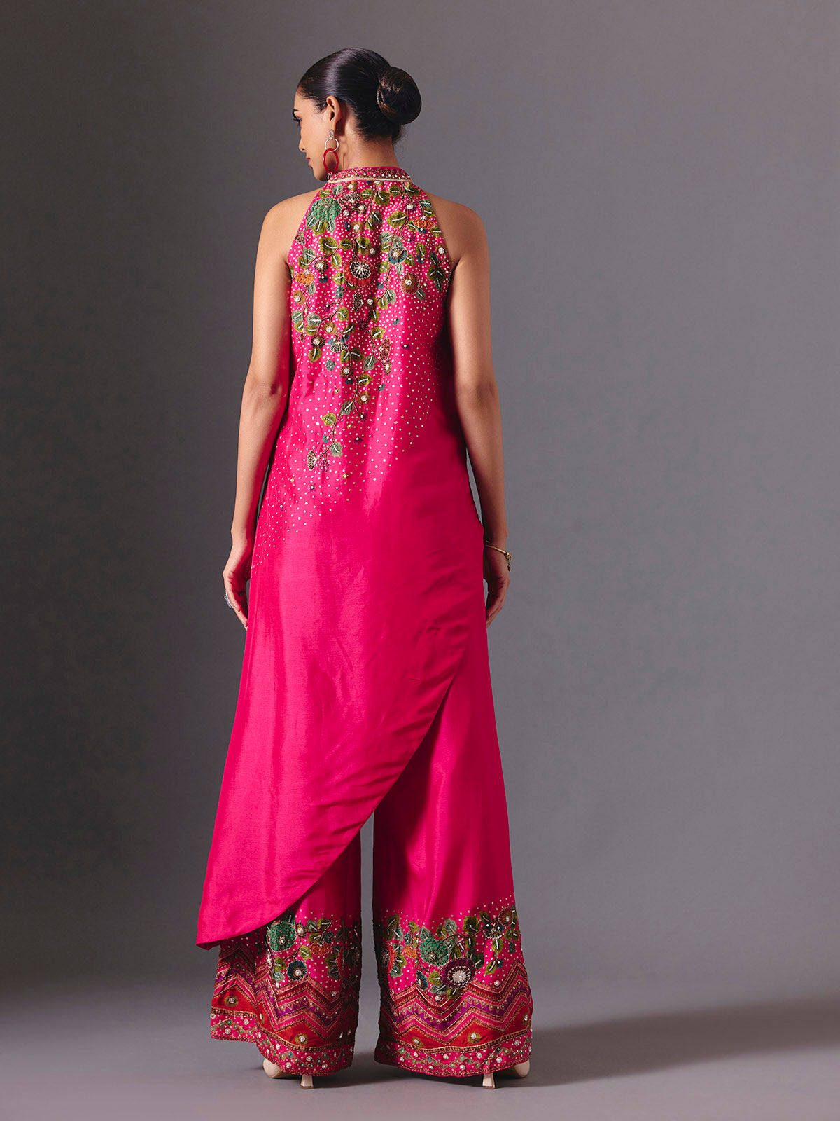 Rani pink silk designer floral palazzo suit with elegant embellishments