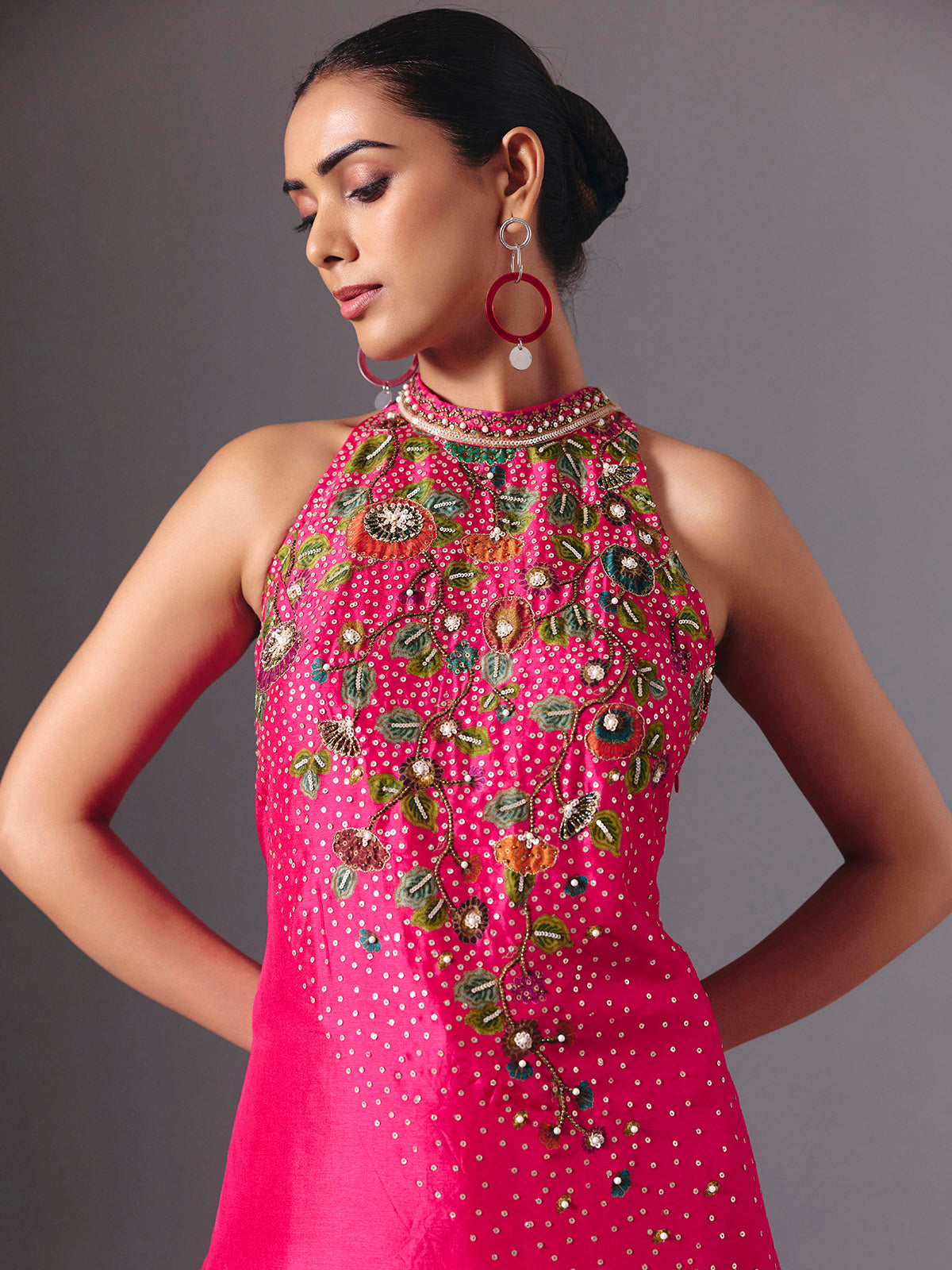 Rani pink silk designer floral palazzo suit with elegant embellishments