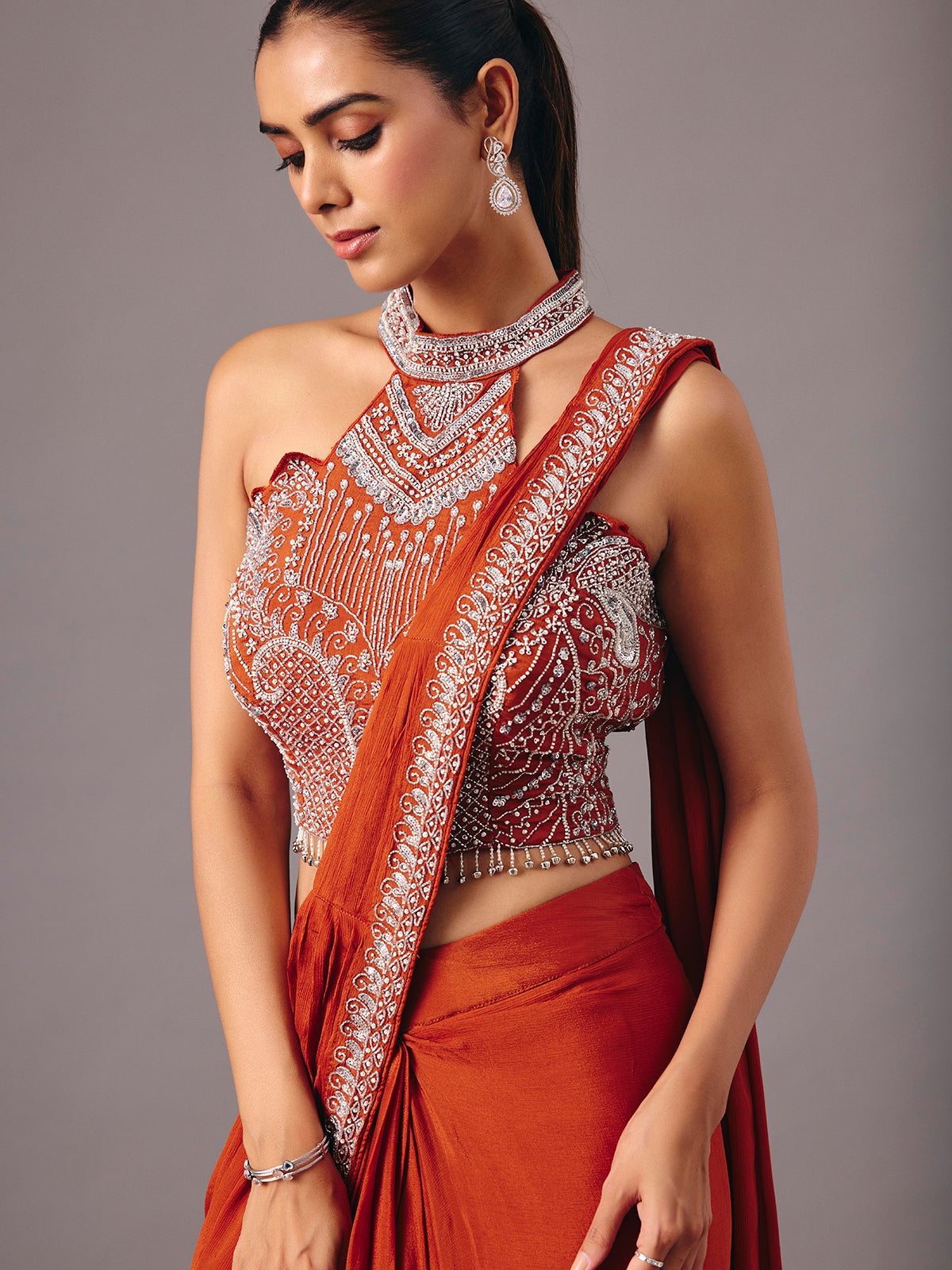Rust orange ready to wear saree with embellished halter blouse for women