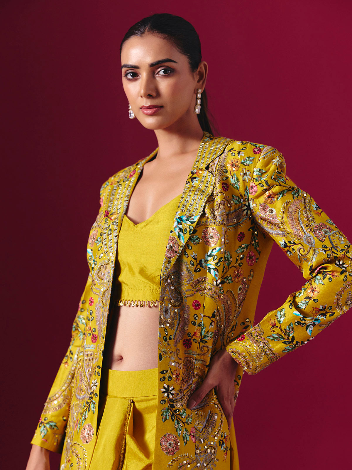 Mustard yellow silk jacket style indowestern suit with floral motifs for women