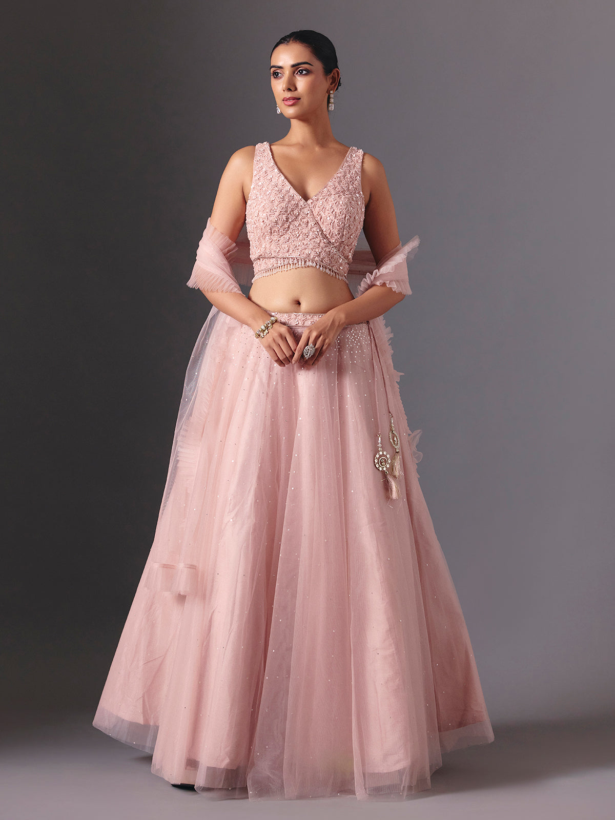 Onion pink net designer lehenga choli with elegant dupatta style