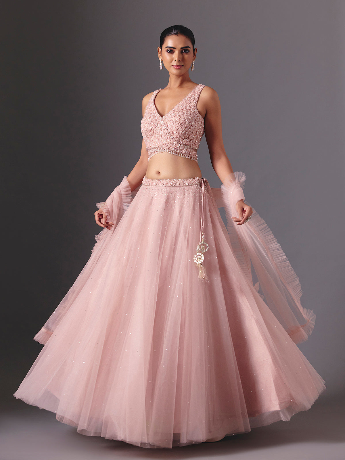 Onion pink net designer lehenga choli with elegant dupatta style