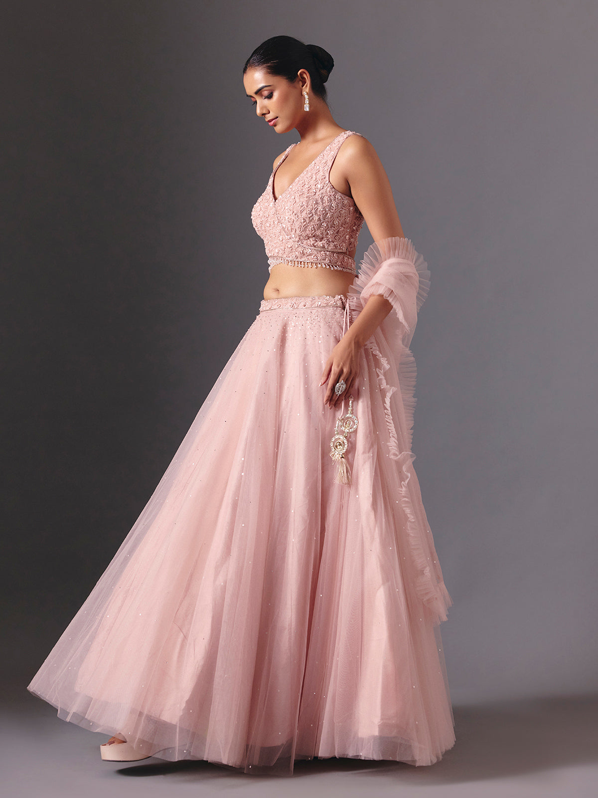 Onion pink net designer lehenga choli with elegant dupatta style