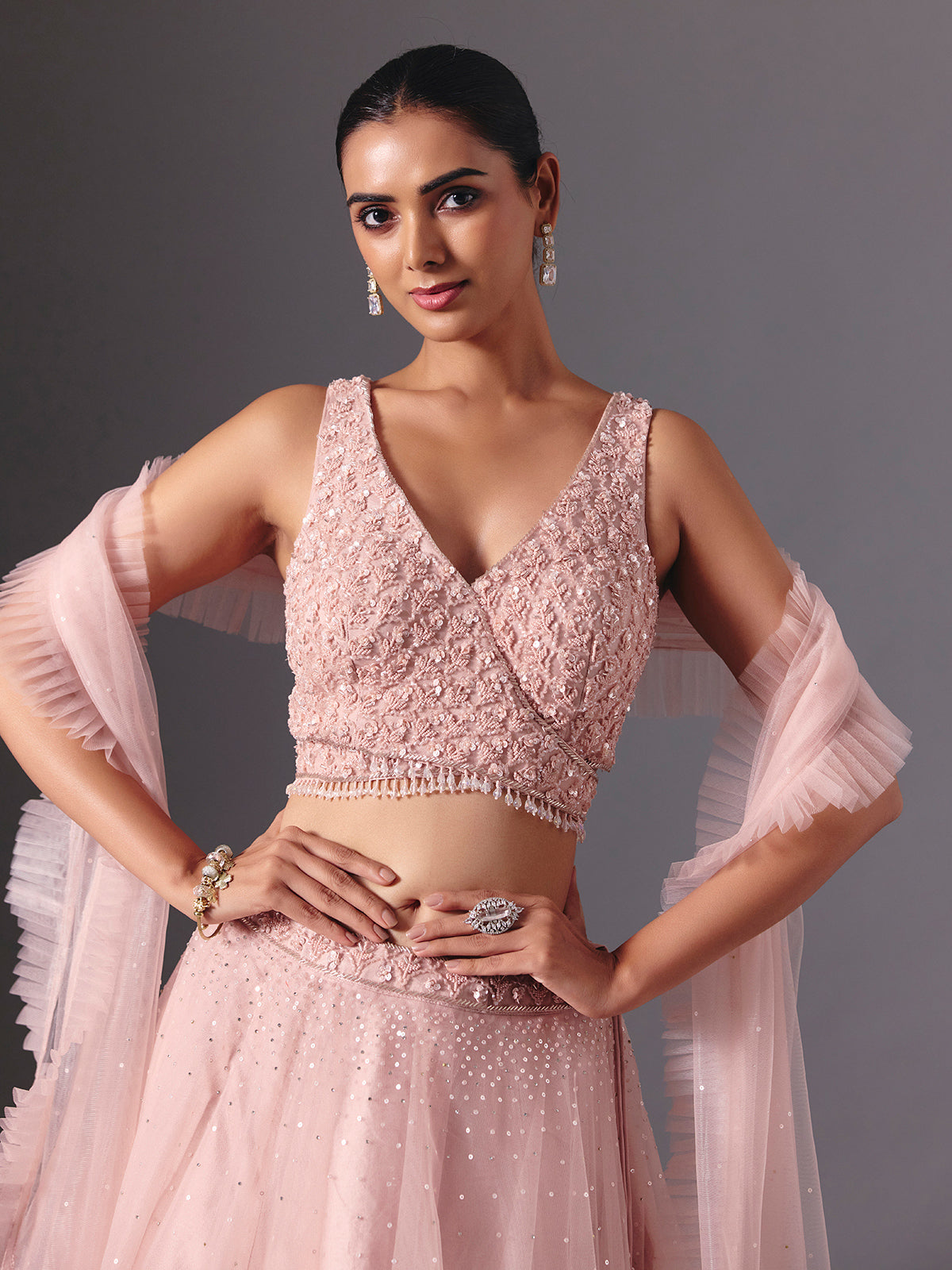 Onion pink net designer lehenga choli with elegant dupatta style