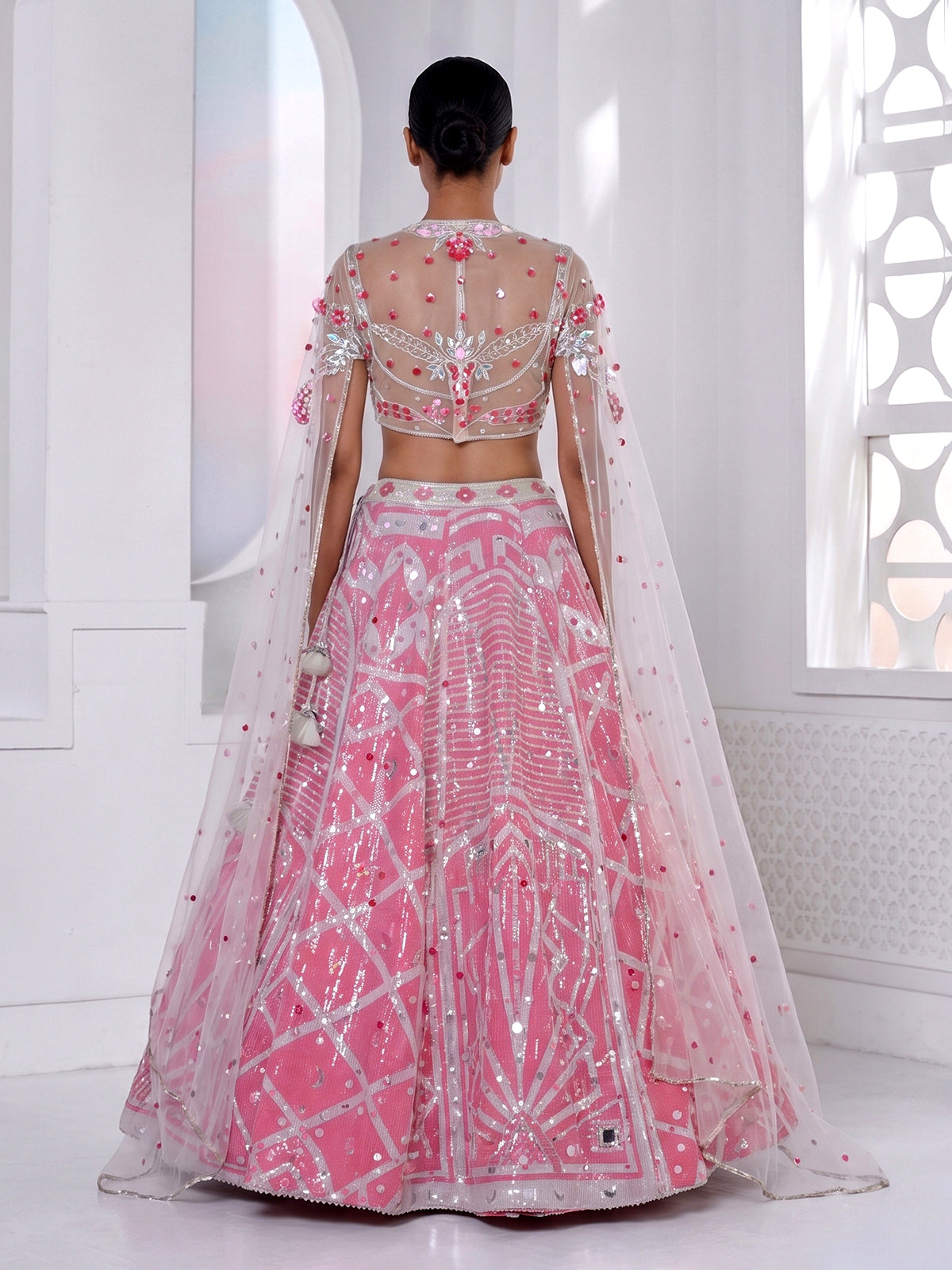 Pink silk cape style designer lehenga ensemble