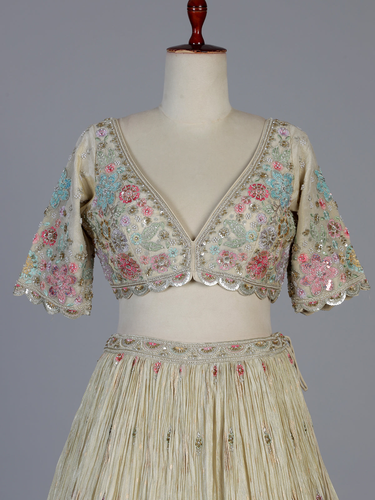 Golden crepe silk botanical embroidered lehenga attire