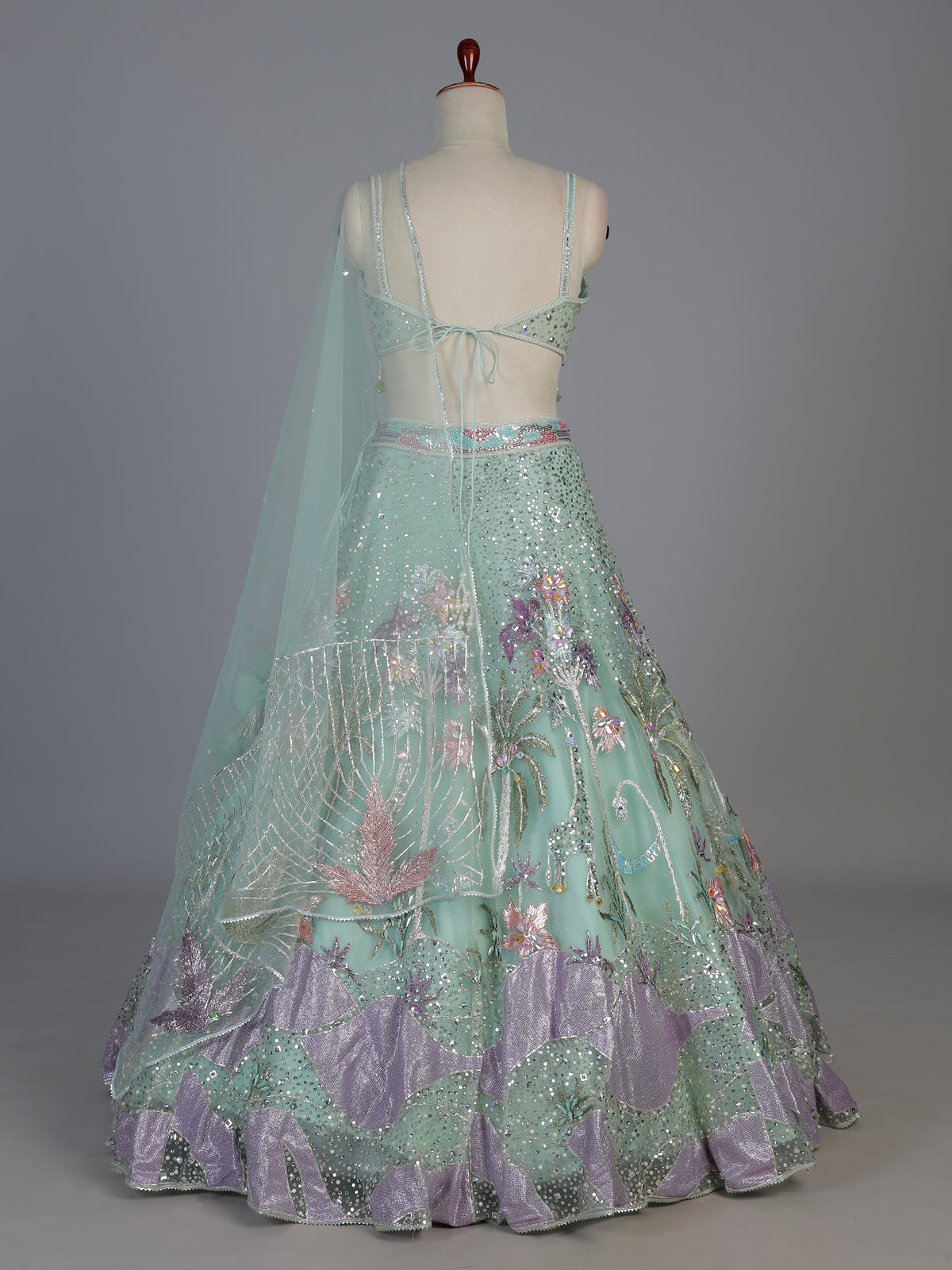 Pista net embellished statement lehenga choli