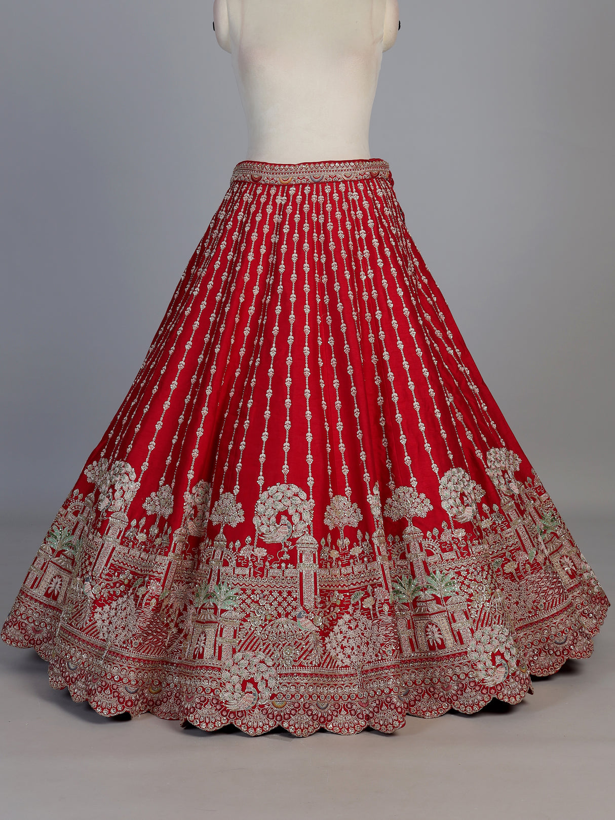 Red raw silk bridal unstitched lehenga choli with zardosi embellishments