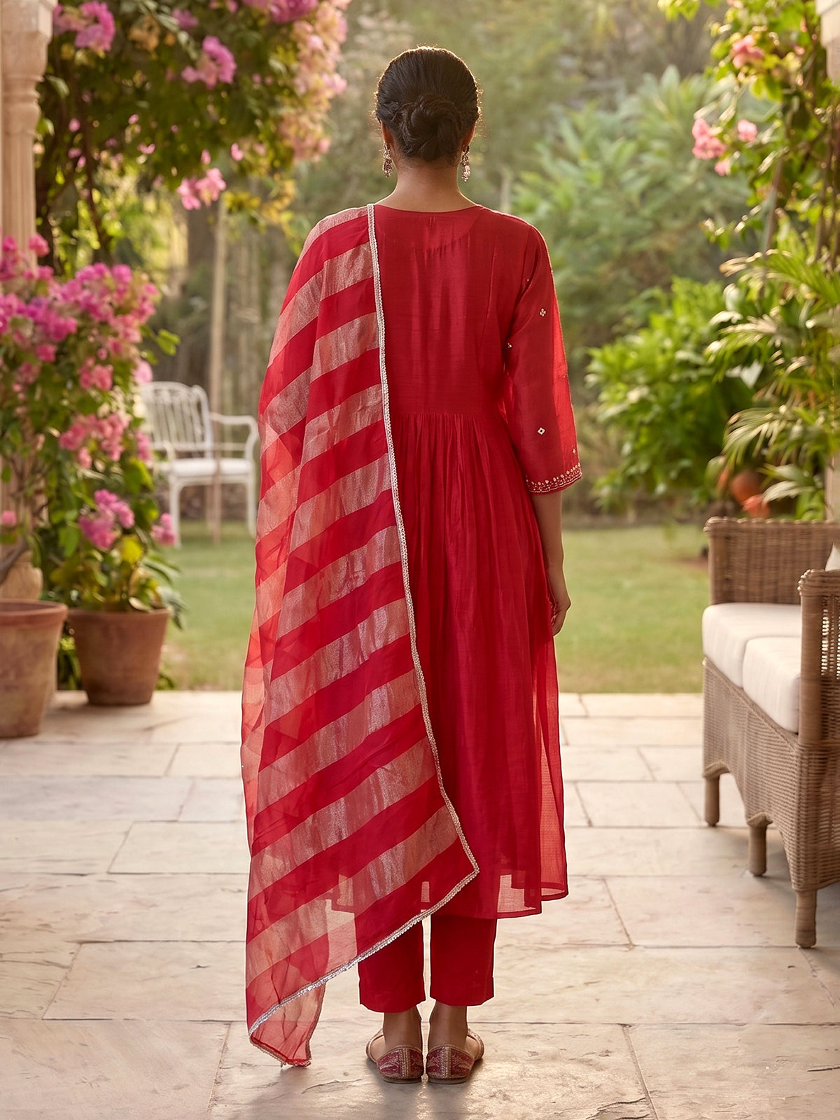 Rani pink tissue yoke kurti set with festive embellishments