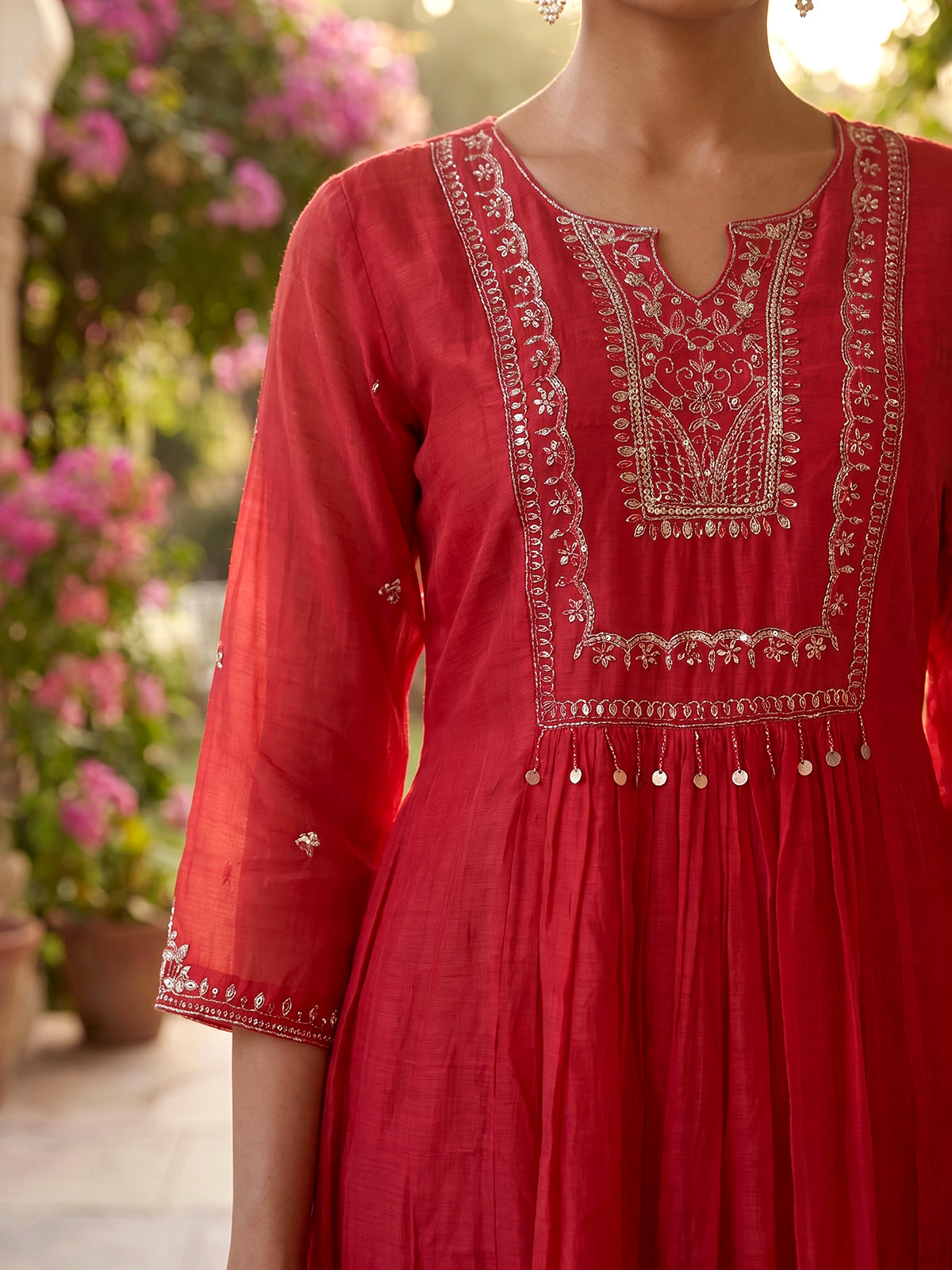 Rani pink tissue yoke kurti set with festive embellishments