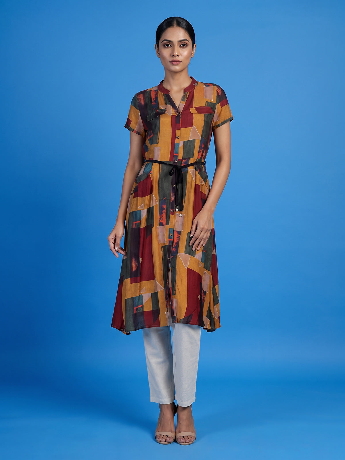Yellow silk printed kurti with waist belt stand collar and cap sleeves