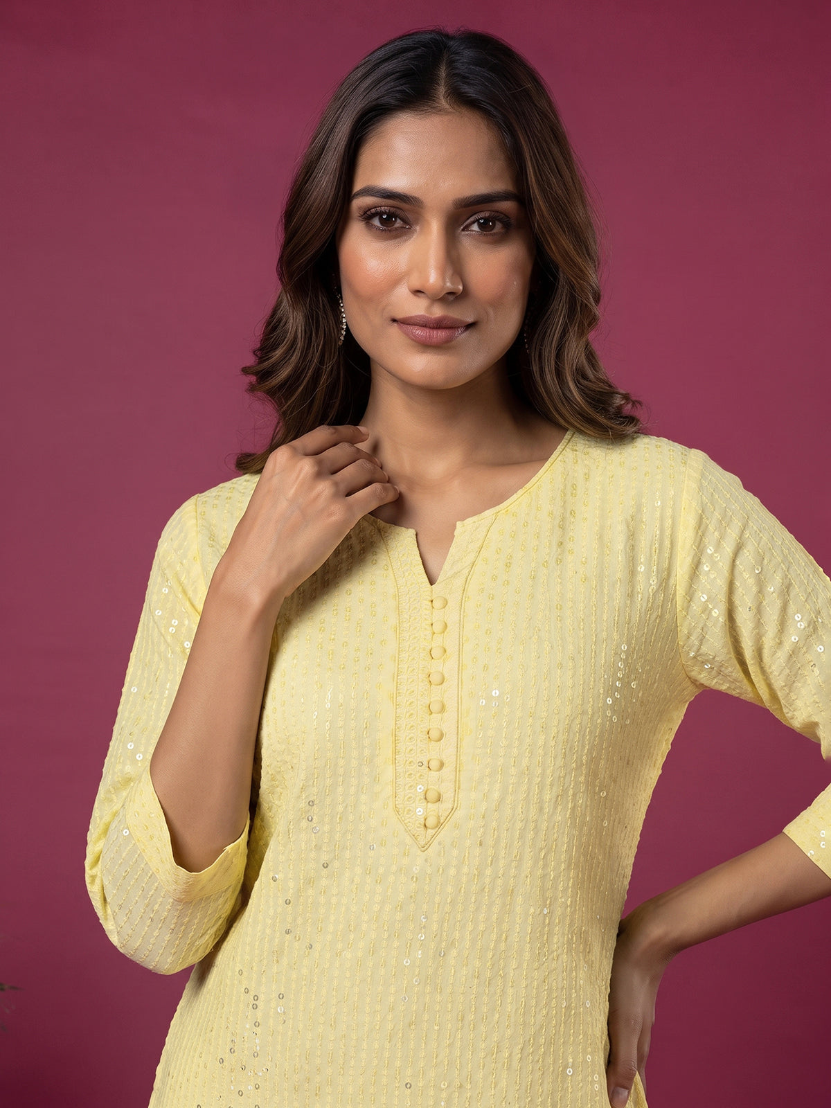 Yellow chikan embroidery kurti with shimmering quarter sleeves