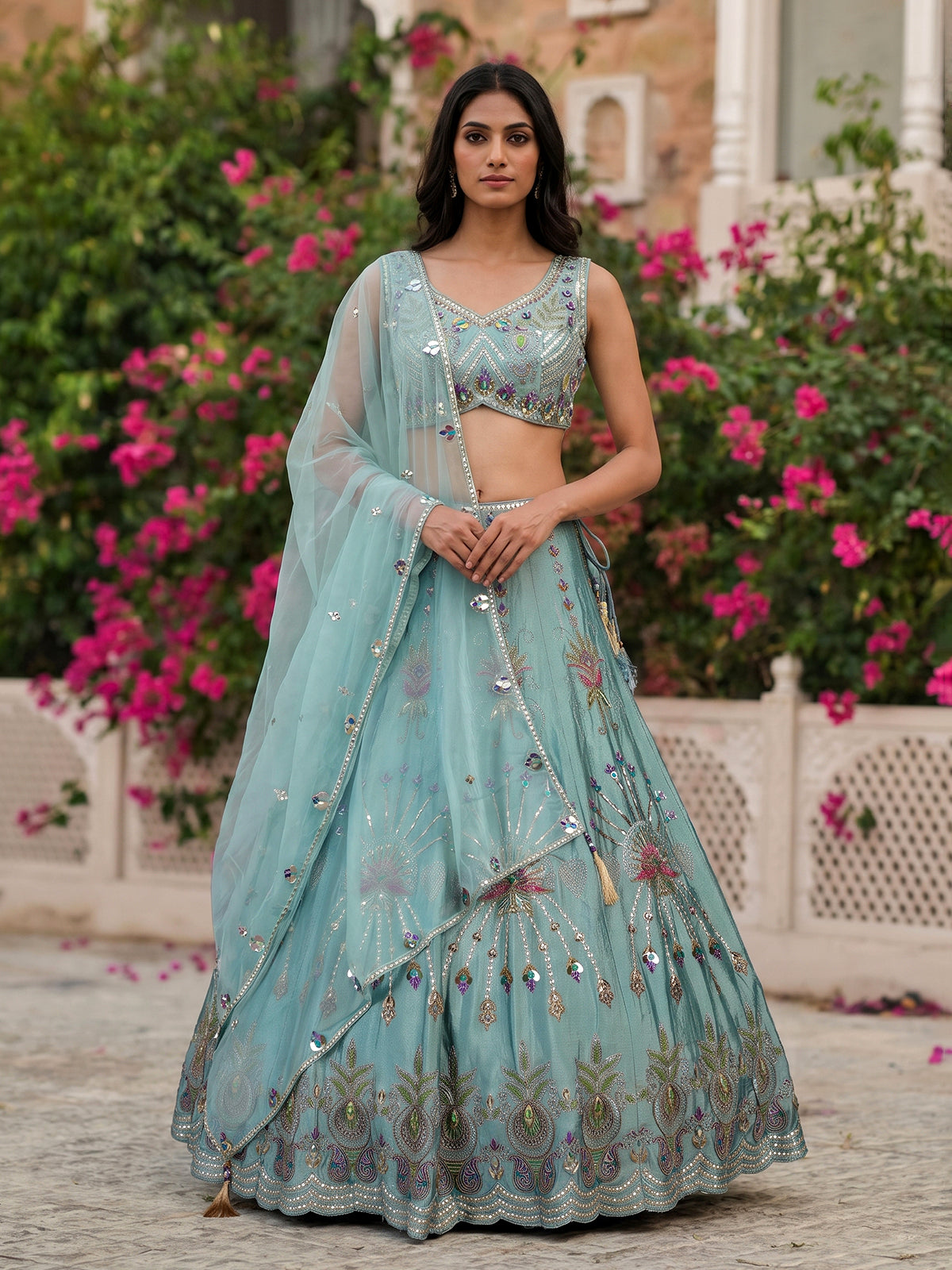 Light blue silk lehenga choli with pearls mirrors and zardosi work