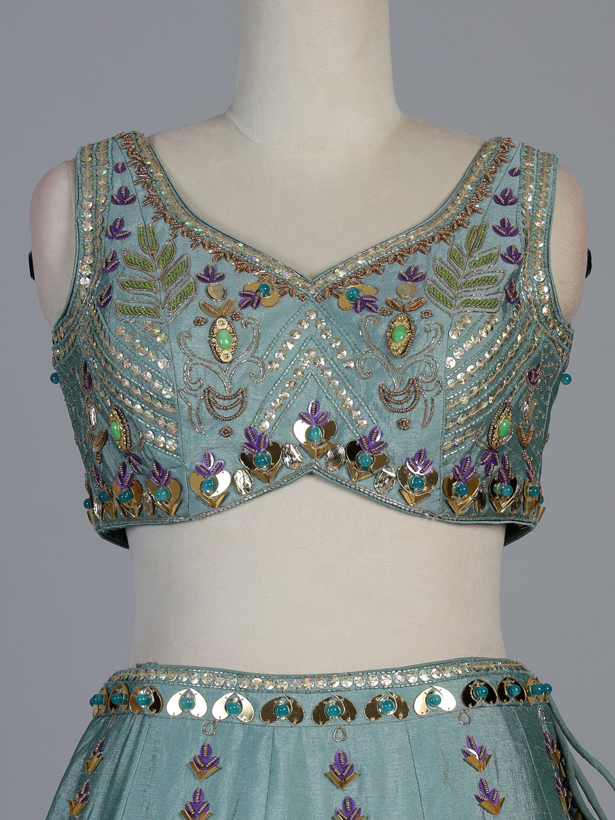 Light blue silk lehenga choli with pearls mirrors and zardosi work