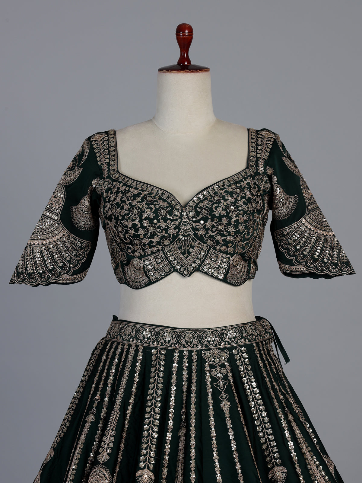 Bottle green silk lehenga choli with embroidered work and dupatta