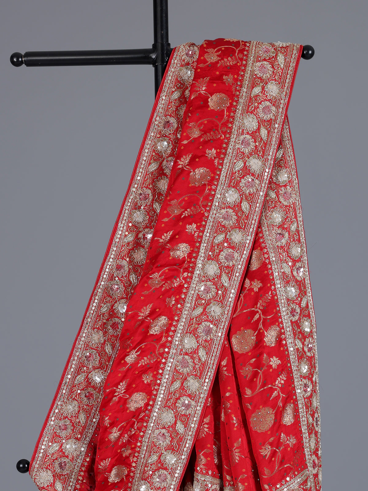 Red dola silk saree with floral zardosi and pearl zari work