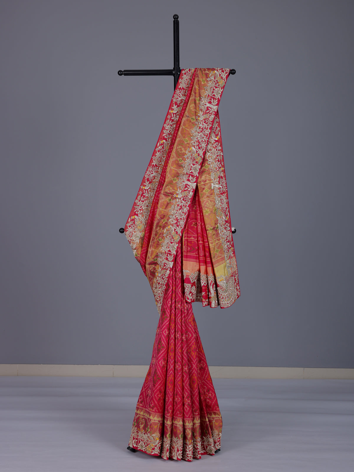 Rani pink patola silk saree with bird motif and zari detailing