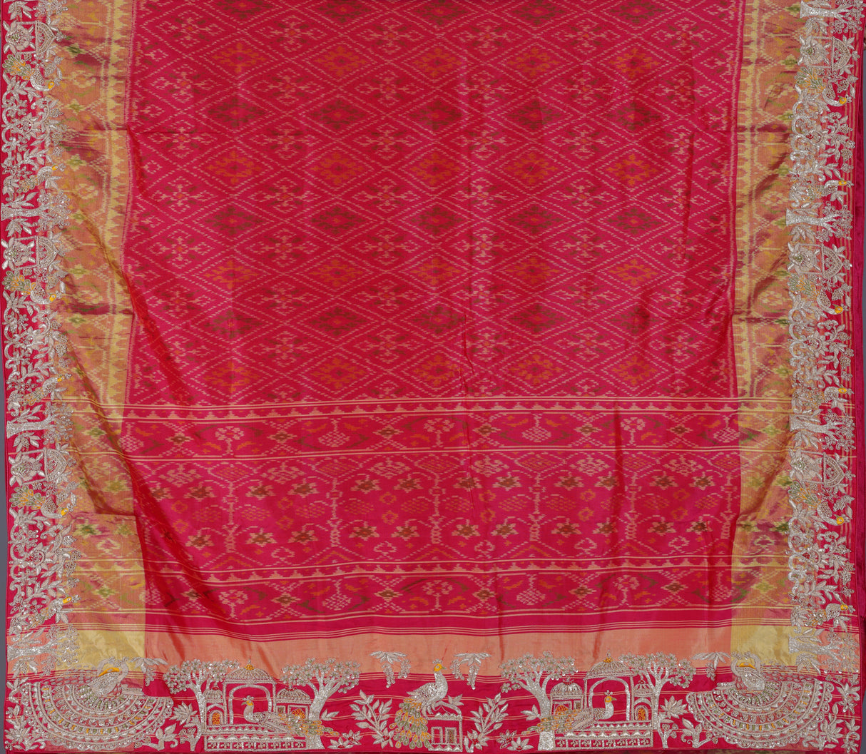 Rani pink patola silk saree with bird motif and zari detailing