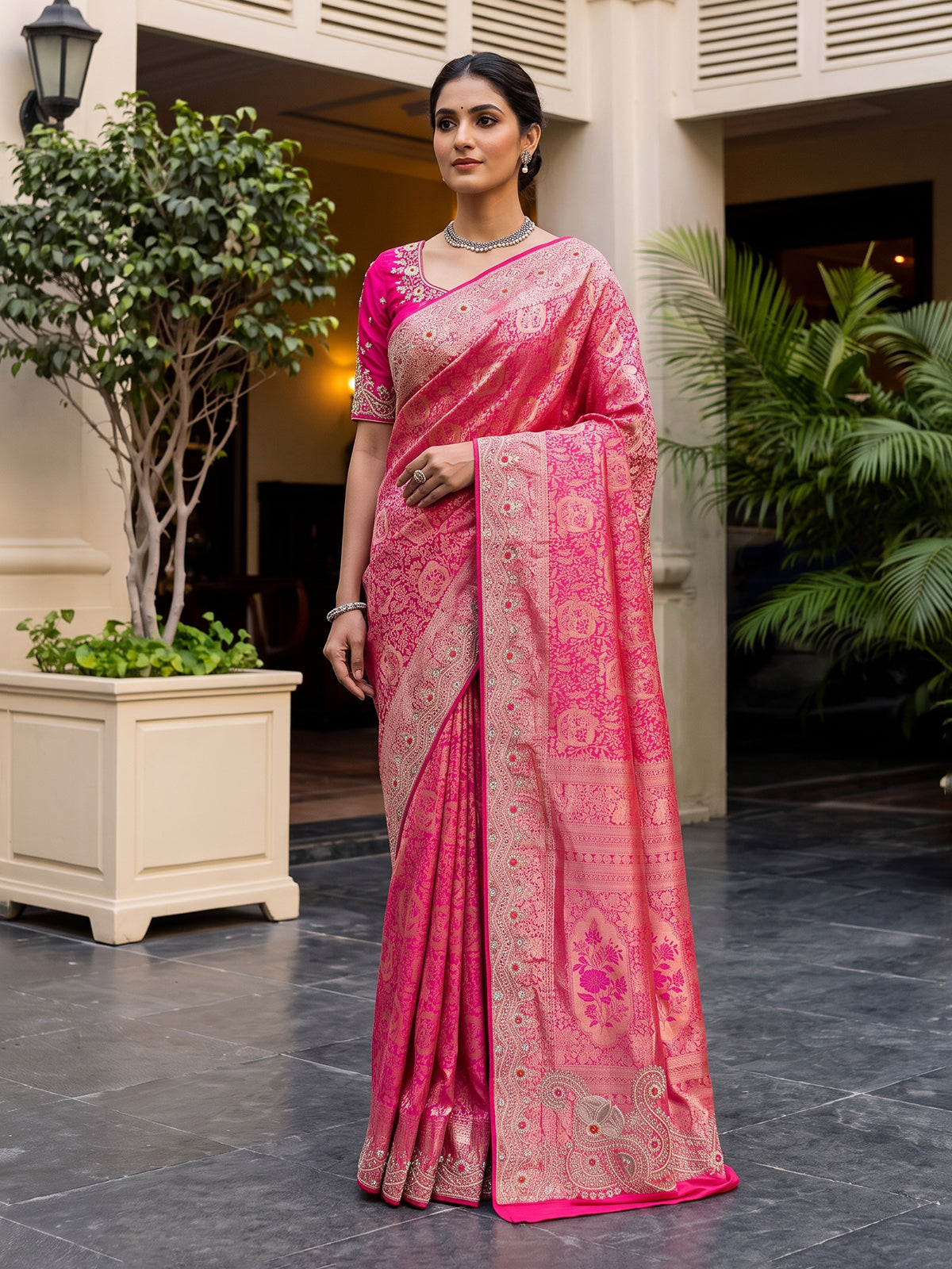 Rani pink kanjivaram silk saree with zardosi and zari work