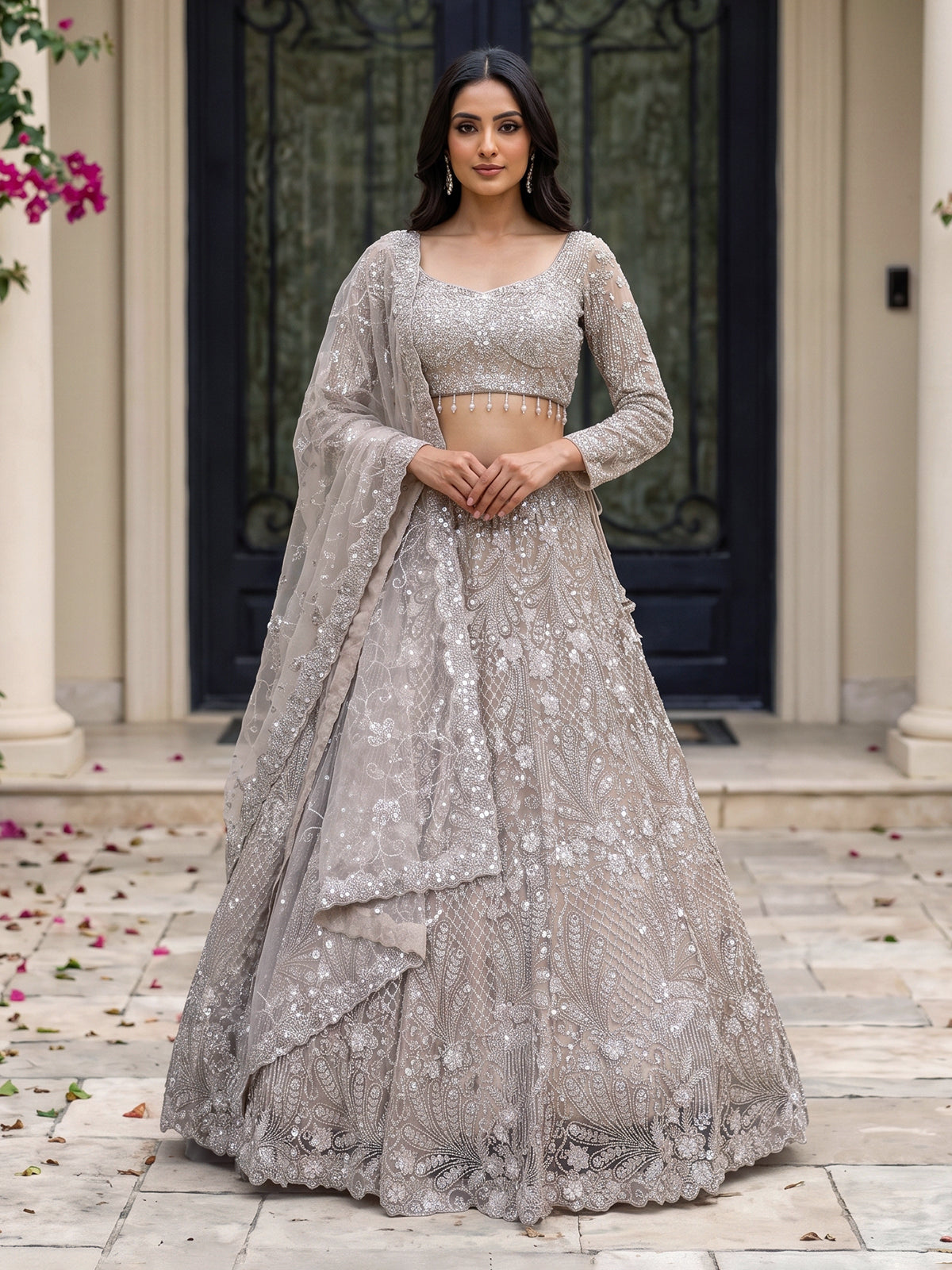 Beige net sequins embellished party lehenga choli