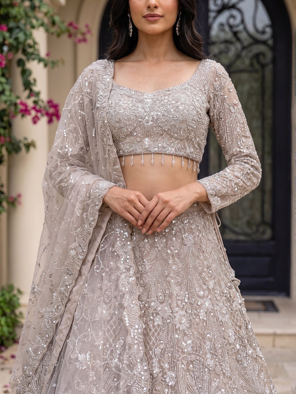 Beige net sequins embellished party lehenga choli