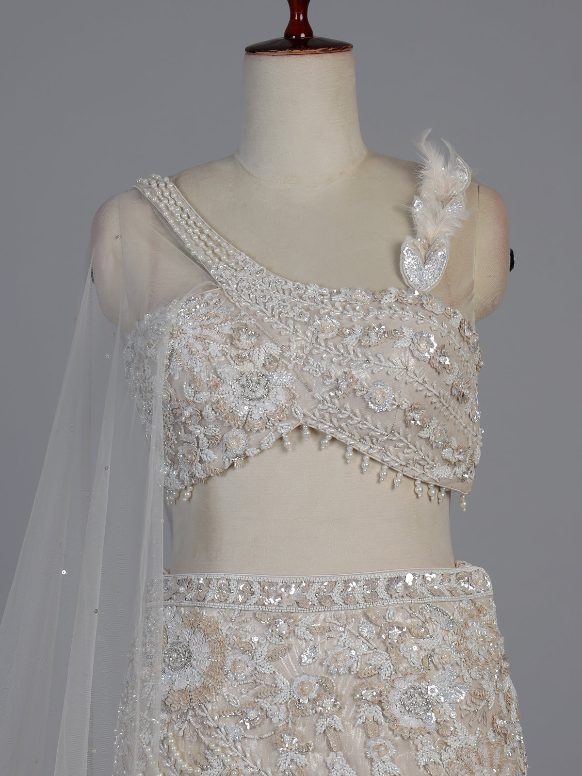 Cream shimmer silk embellished festive lehenga choli