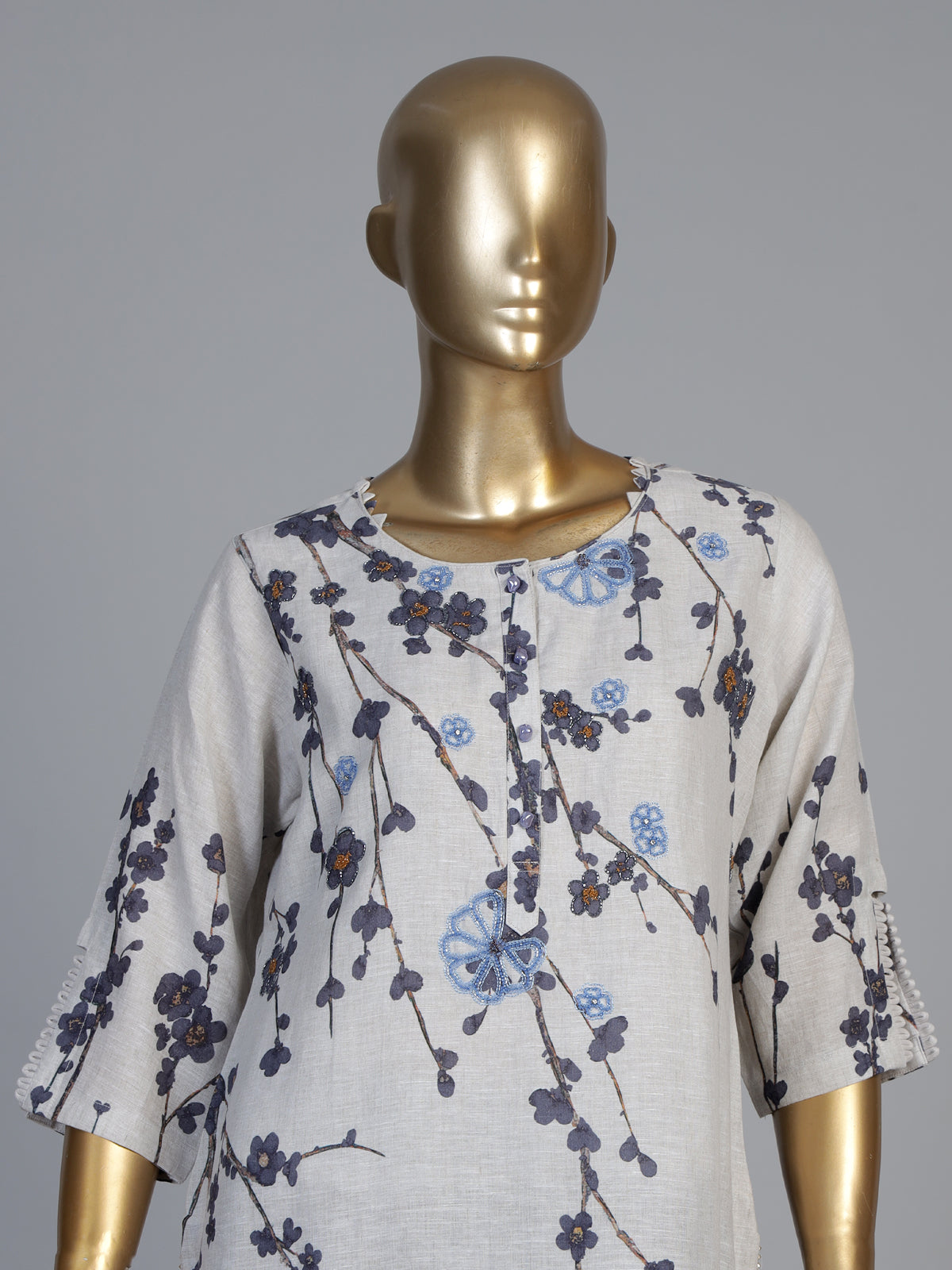 Off white blue linen floral kurti set with diamond embellishments
