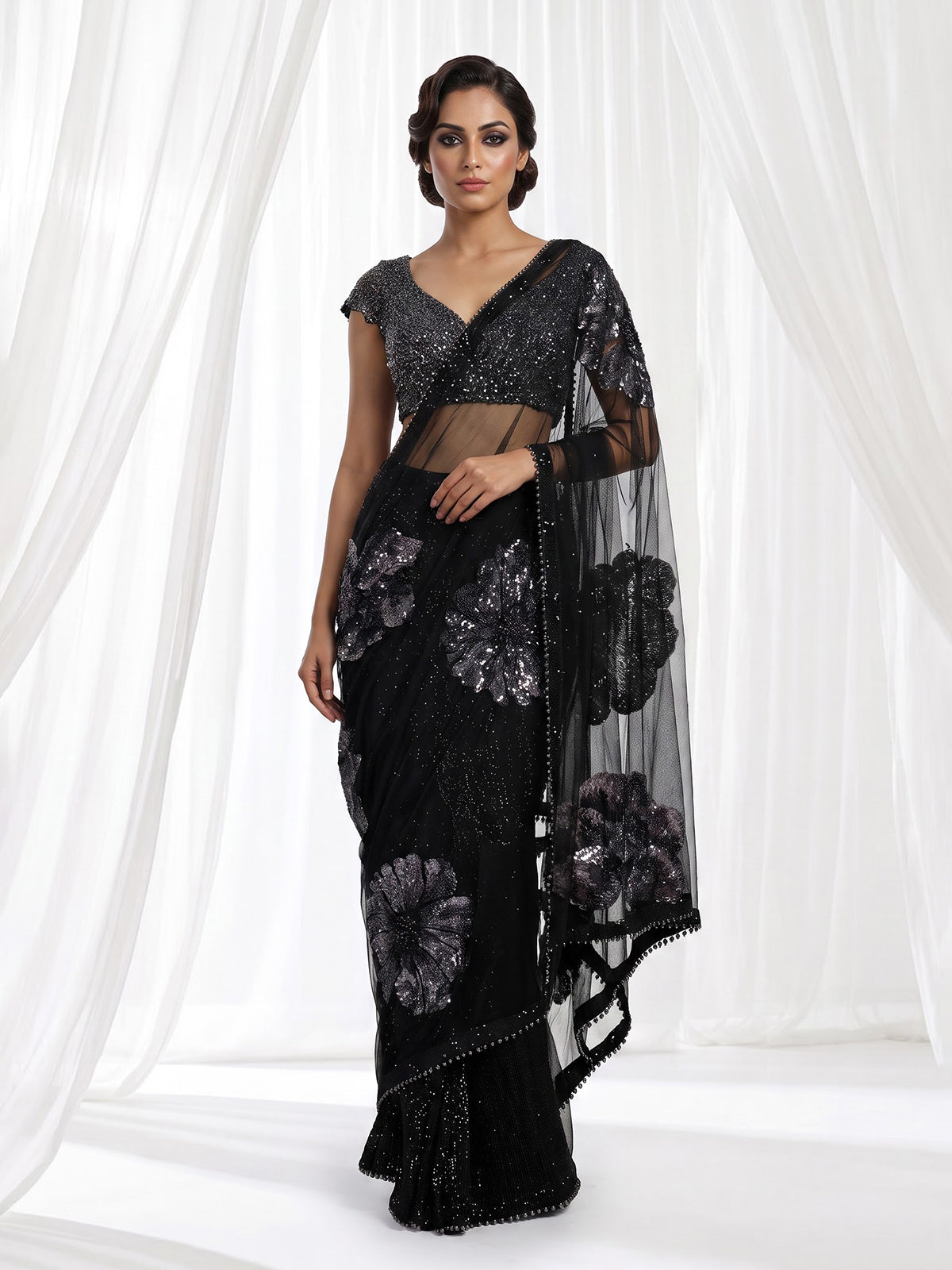 Black net designer saree with floral sequin embellishments