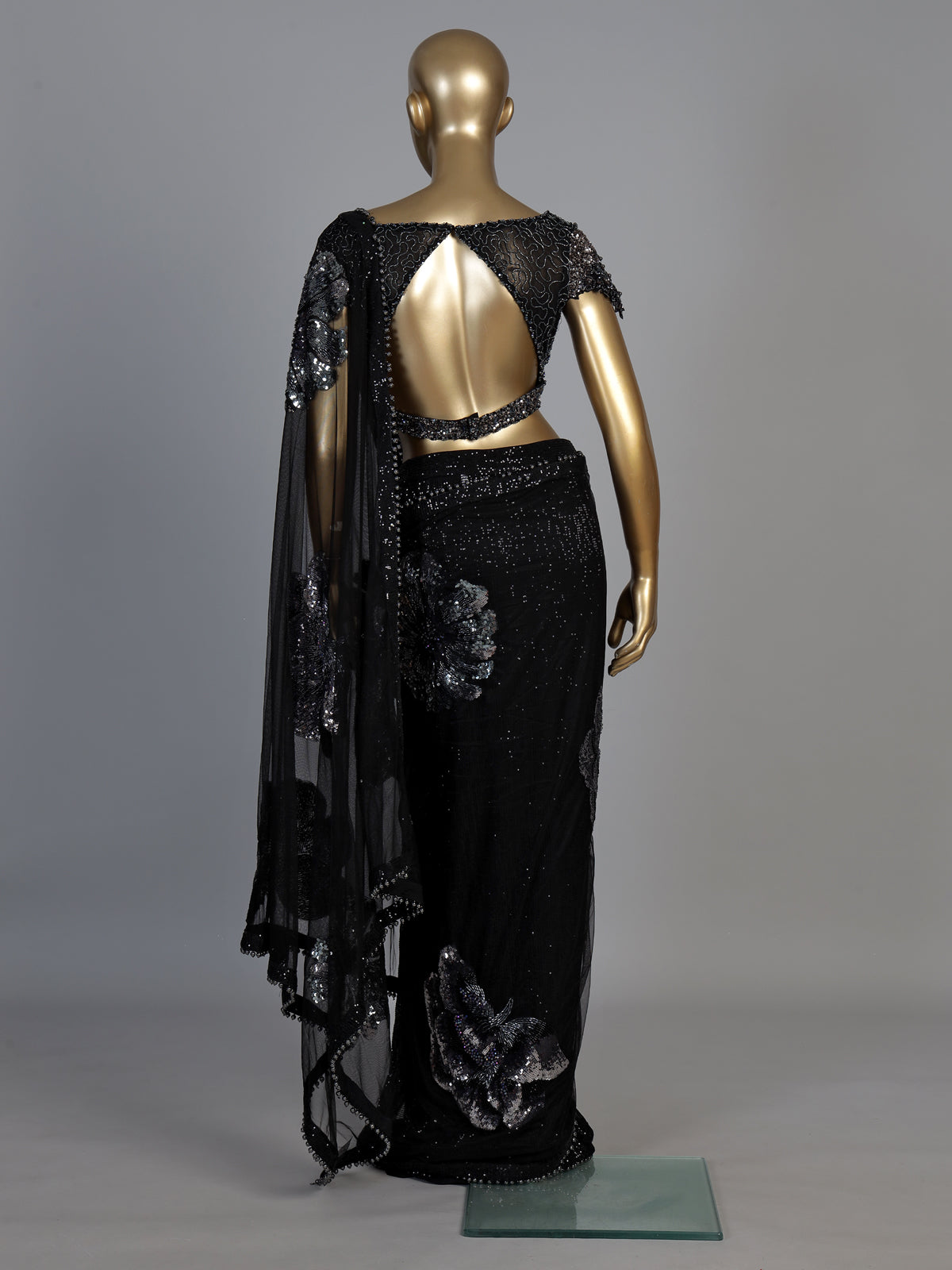 Black net designer saree with floral sequin embellishments