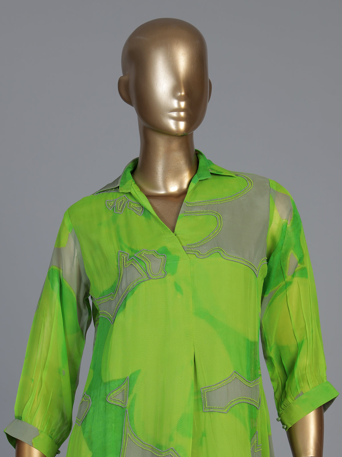 Green georgette printed kurti with delicate bead embellishments