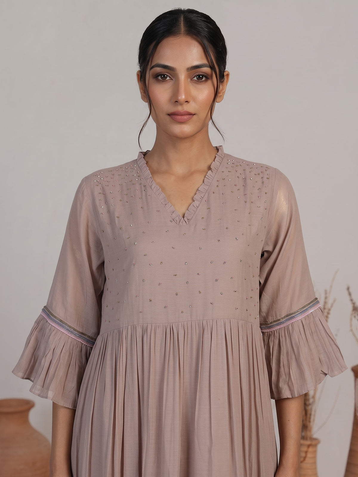 Dark beige silk kurti with embroidered detailing