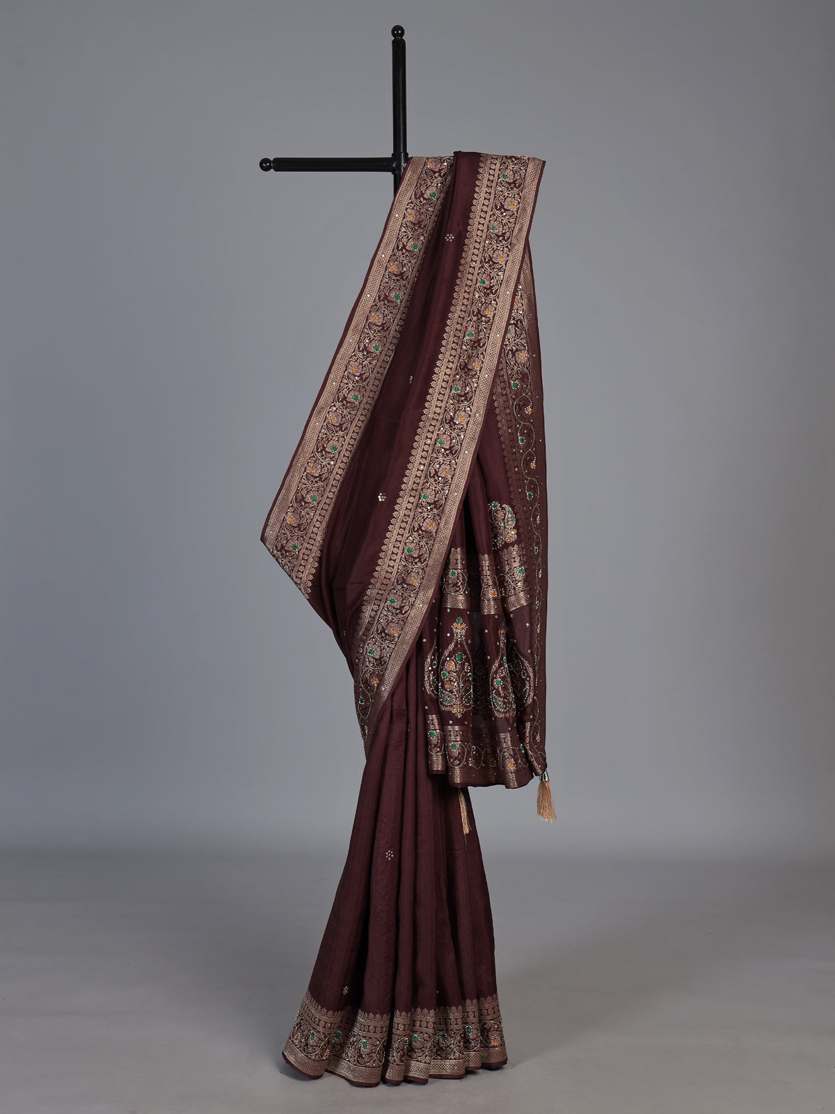Brown dola silk saree with floral tassel embellished design