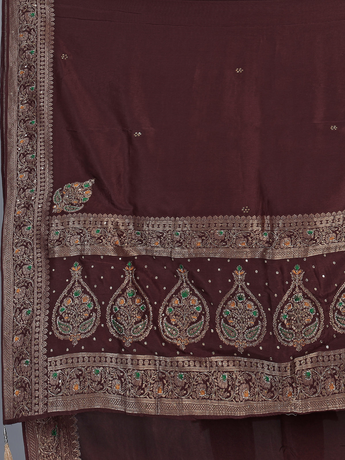 Brown dola silk saree with floral tassel embellished design