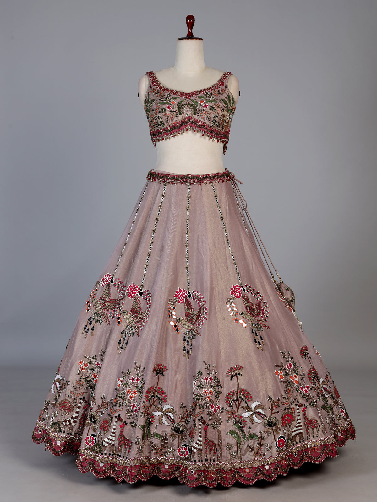 Pastel beige silk bird motif lehenga choli for designer