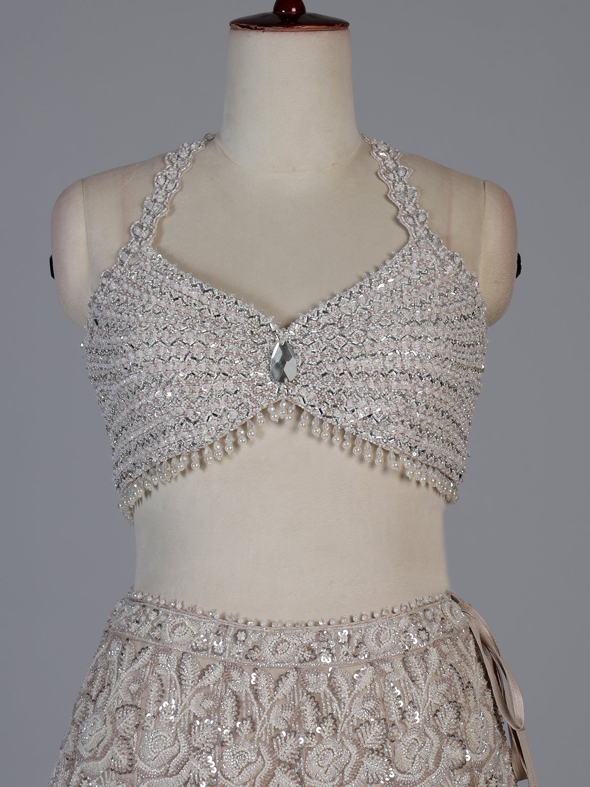 Beige floral designer net lehenga choli with dupatta