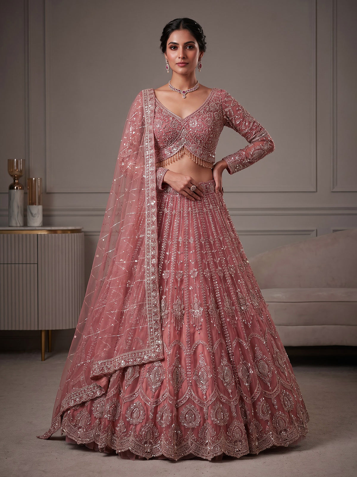 Peach designer net lehenga choli with graceful dupatta