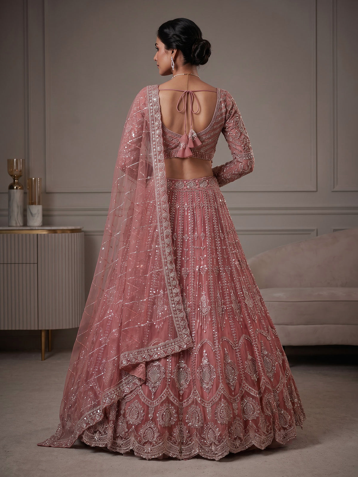Peach designer net lehenga choli with graceful dupatta