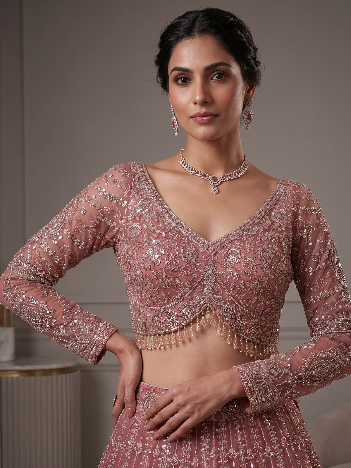 Peach designer net lehenga choli with graceful dupatta