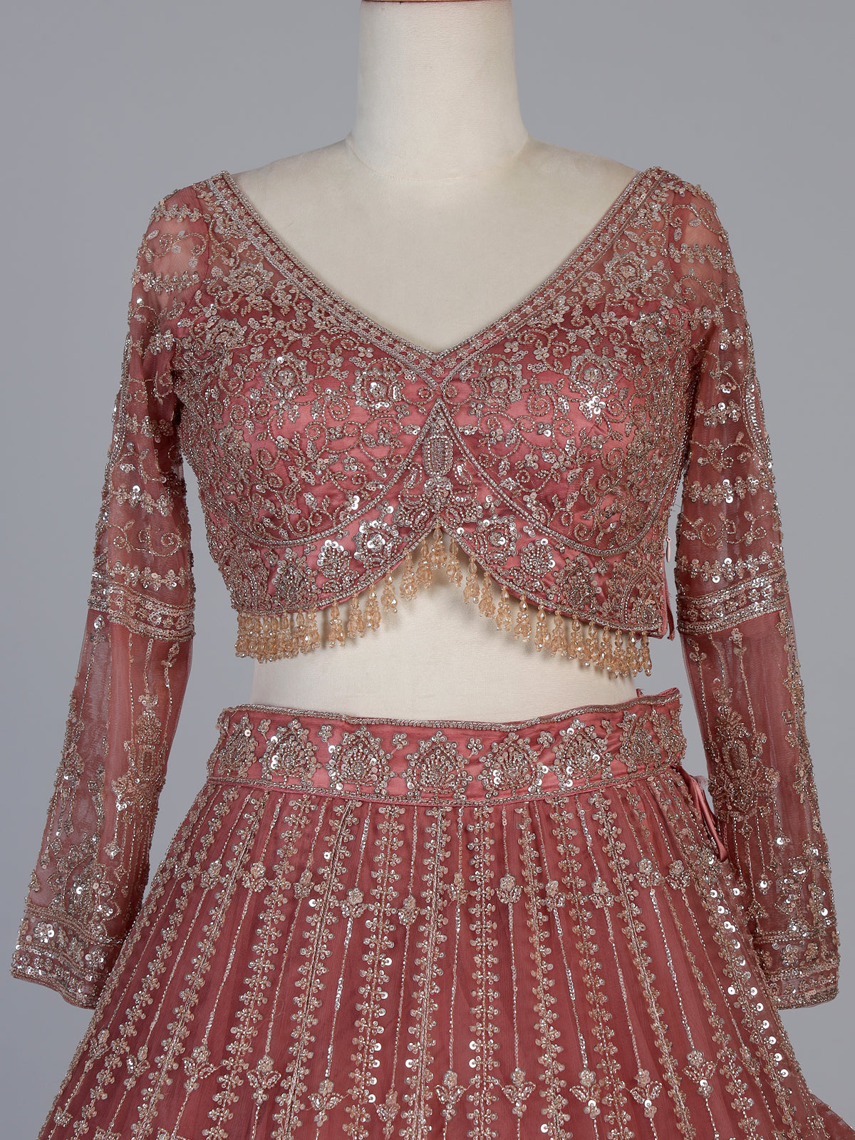 Peach designer net lehenga choli with graceful dupatta