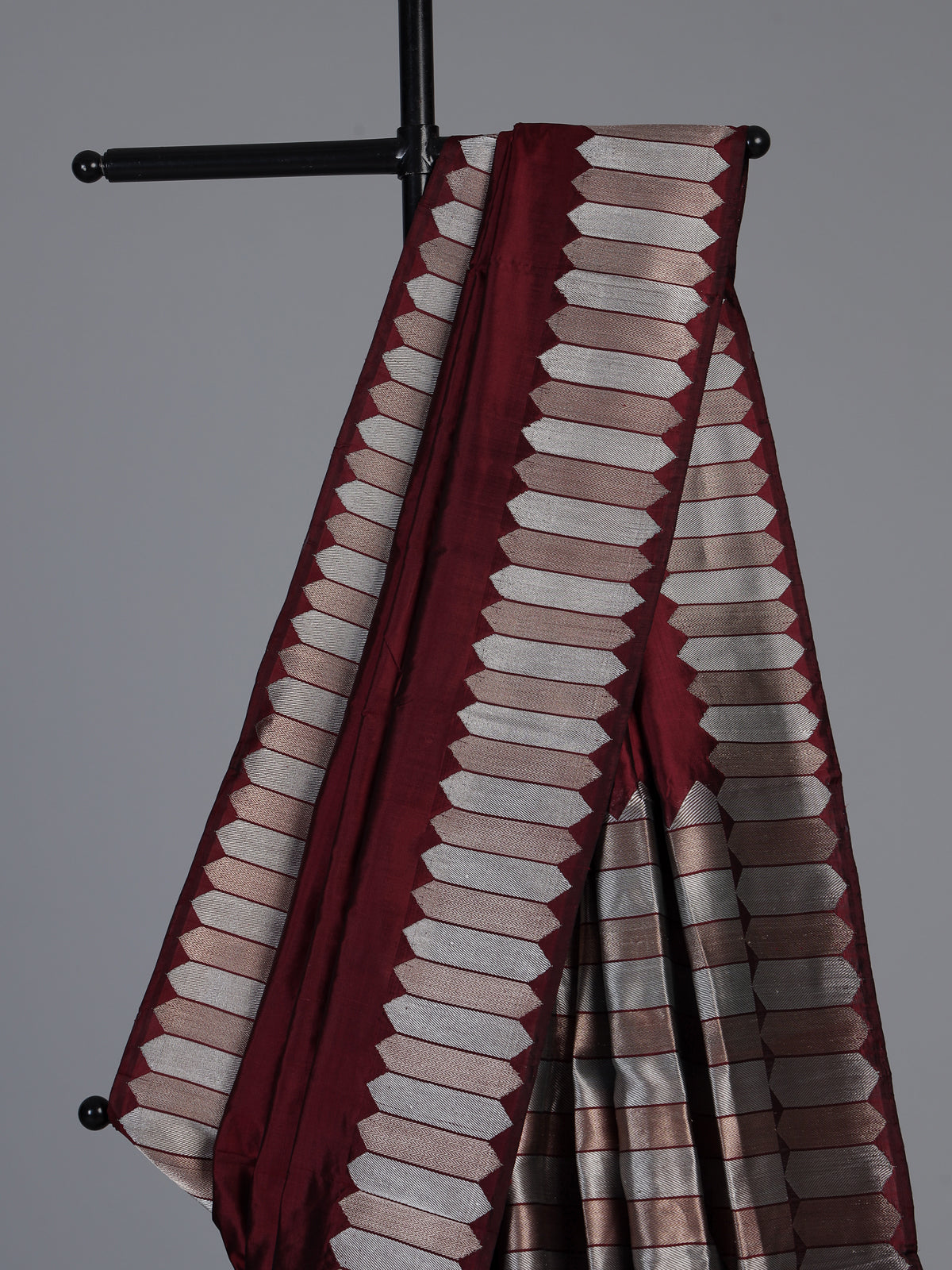 Maroon satin silk saree with elegant zari border and pallu