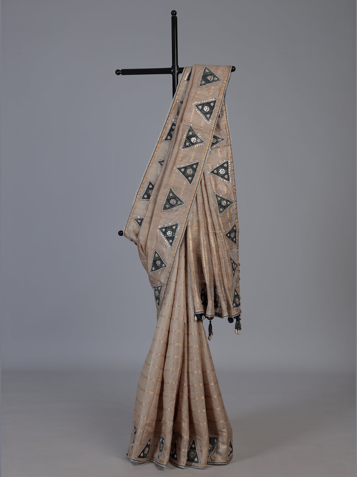 Beige tusser silk saree with regal zardosi embellishments