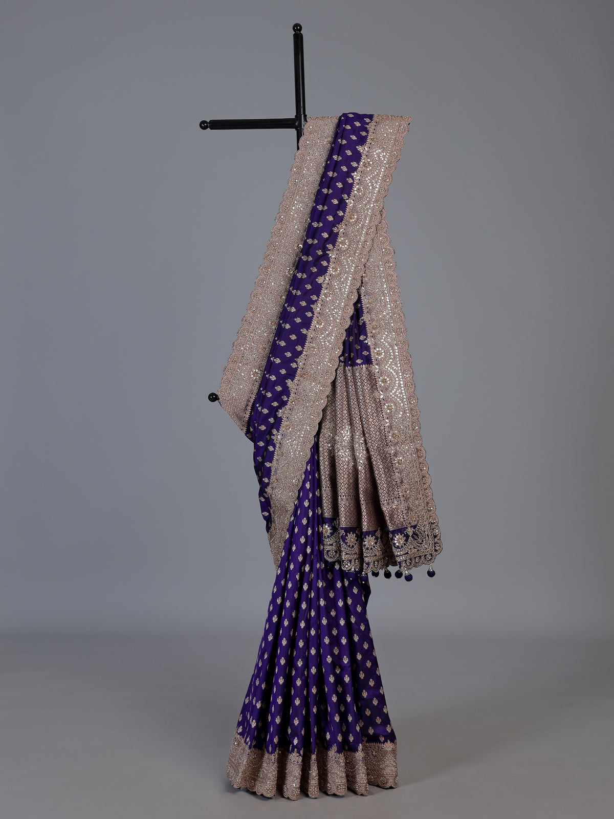 Blue banarasi silk saree with elegant butti and handwork design