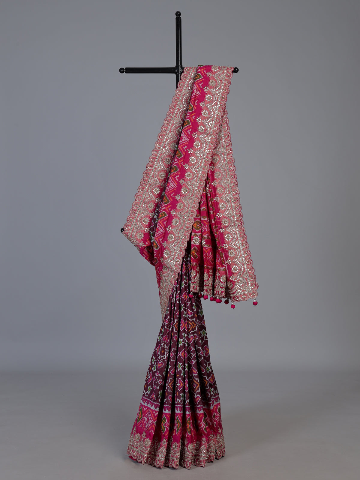 Wine Hyderabadi patola silk saree with rich hand work
